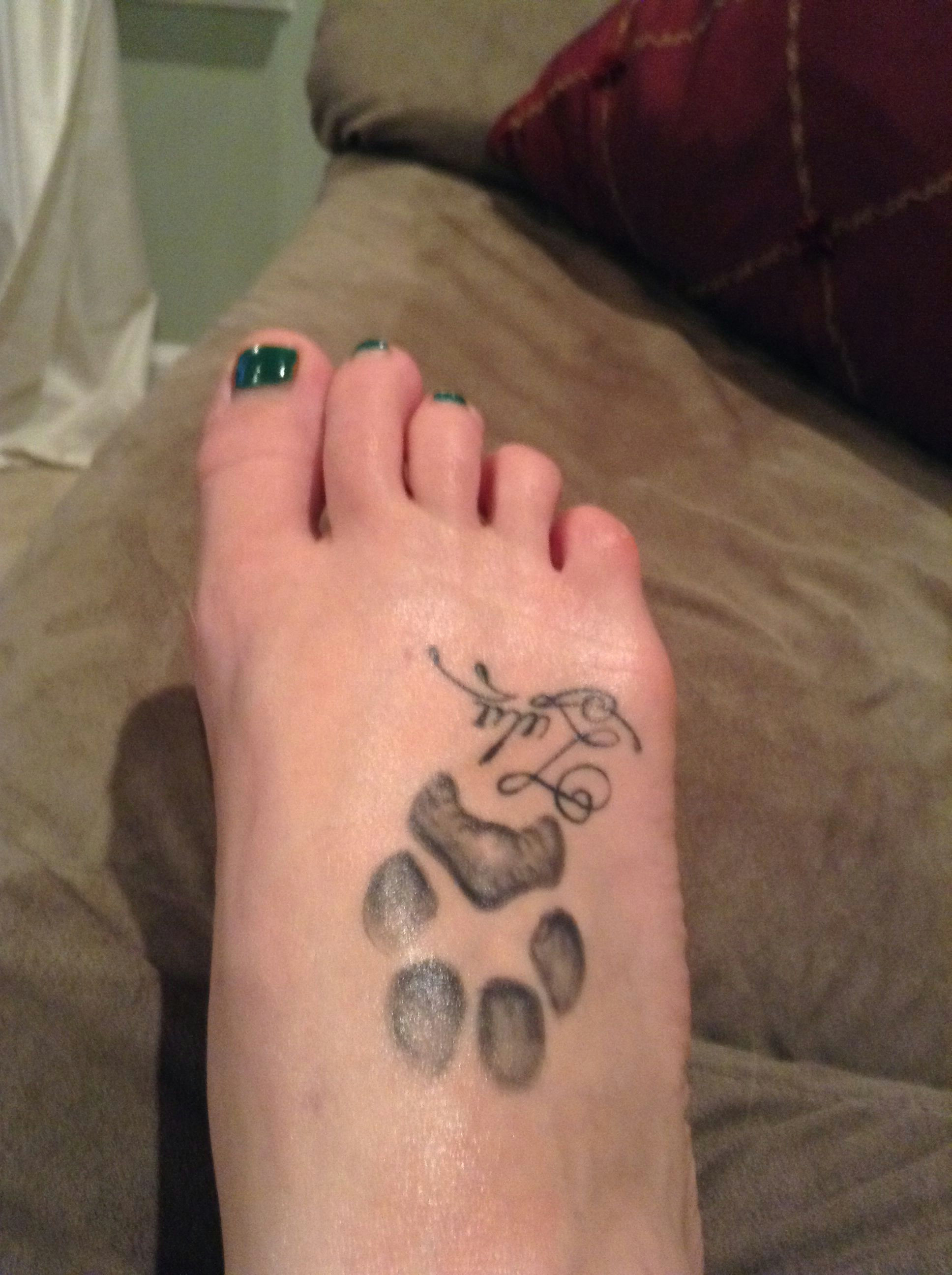 dog paw print tattoo with her name foot tattoo