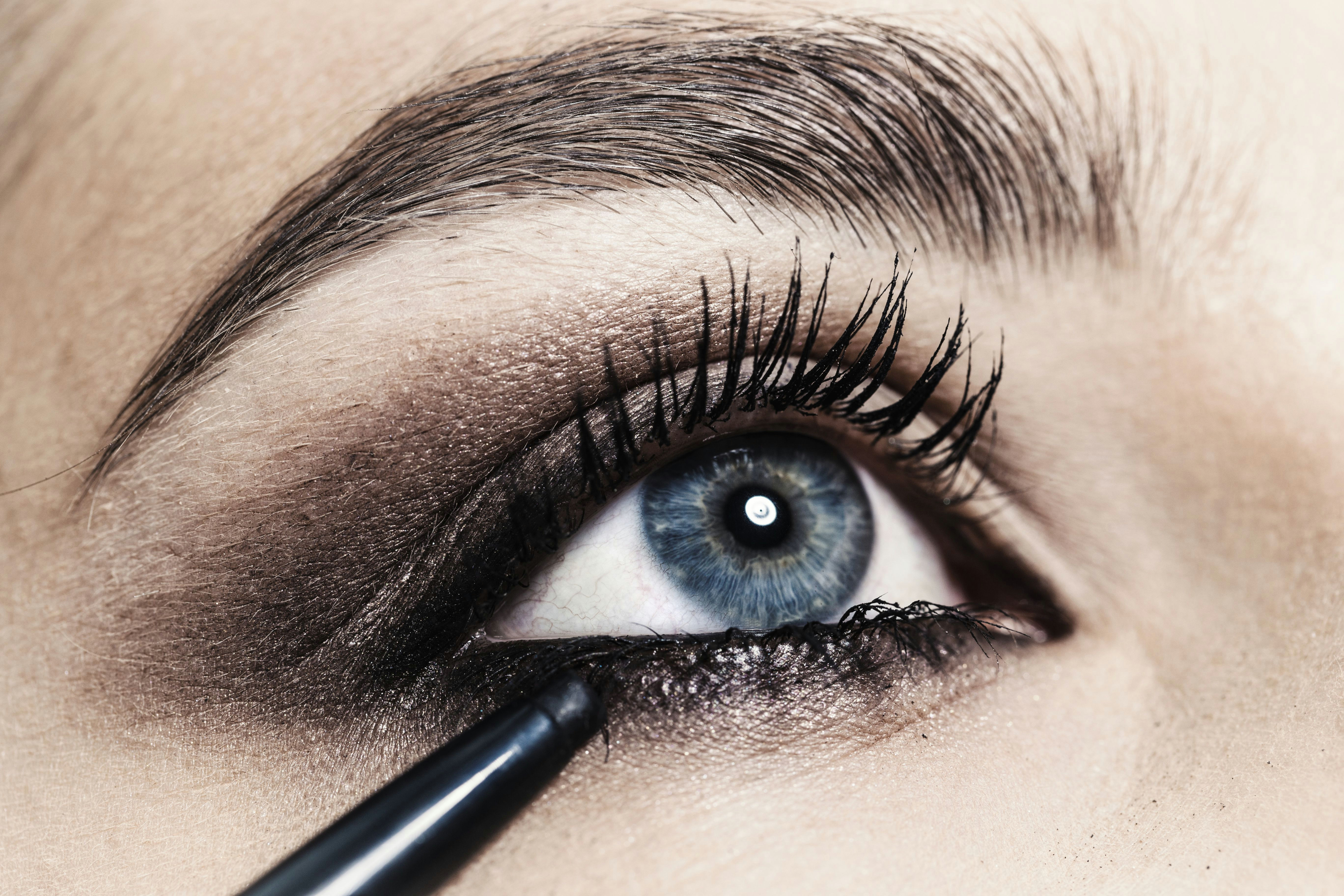 close up of eyeliner being applied to young womans eye 713770559 5aa1d708ff1b780036605c55 jpg