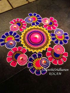 kolam mandala circle round drawing art pink purple yellow