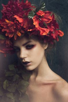 girl with red flowers in hair beauty shoot romantic flowers red flowers portraits