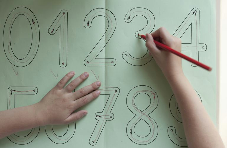 young student doing math exercises
