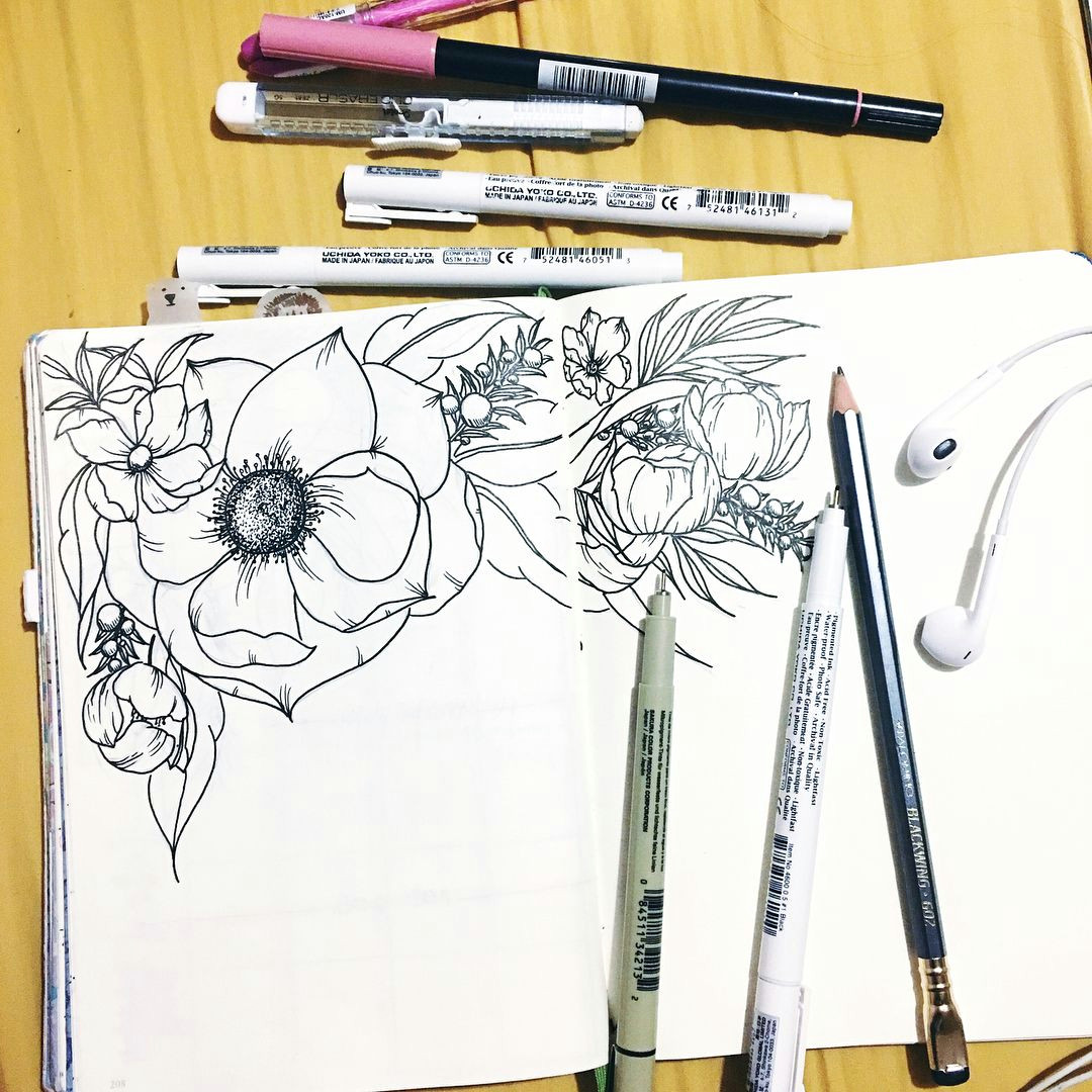 ah yes this is what bullet journal spreads are made of unnecessarily large flowers that look so so pretty swipe right for details