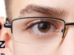 boy with glasses eye test jpg