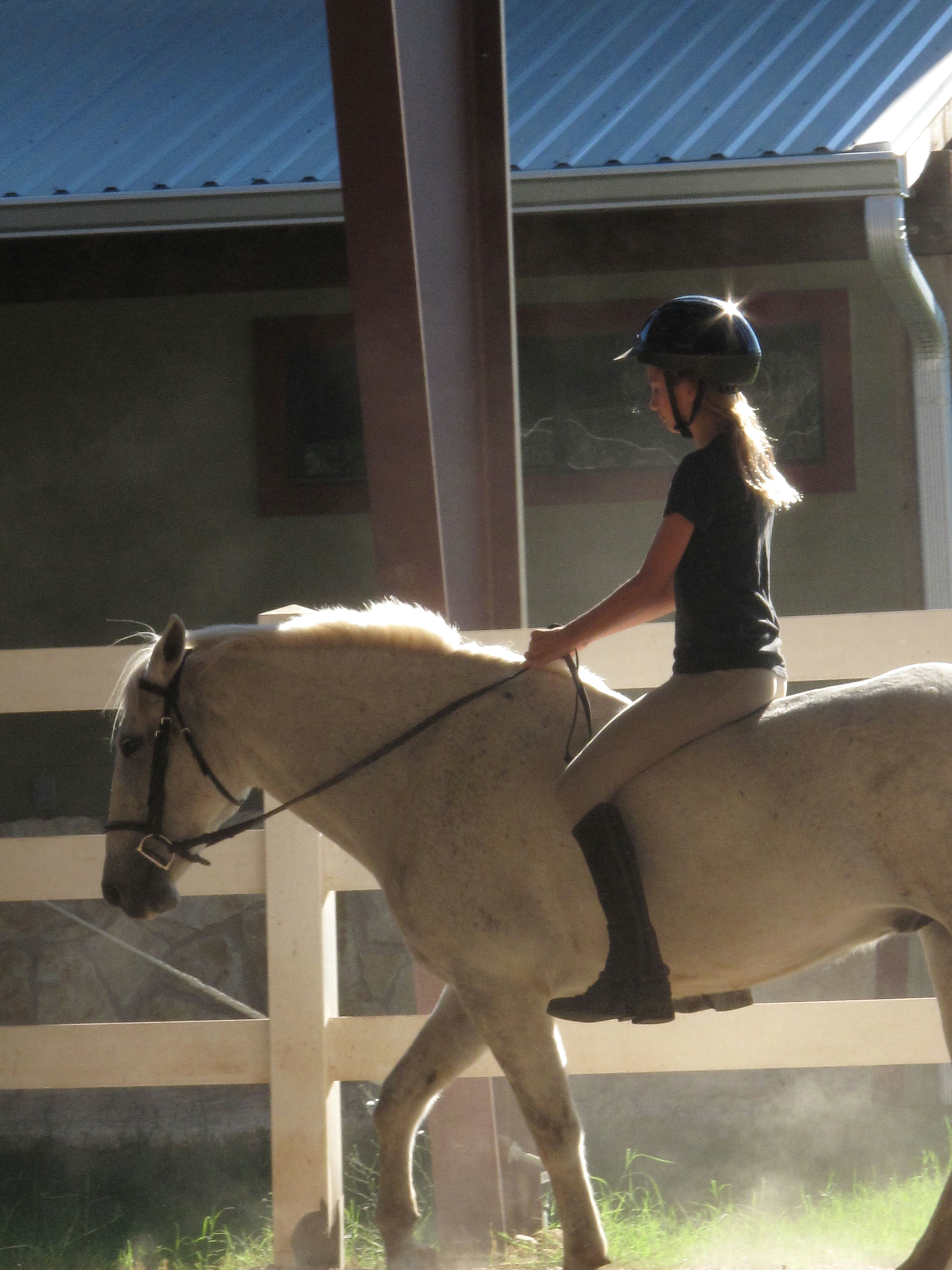 a girl and her horse riding bareback