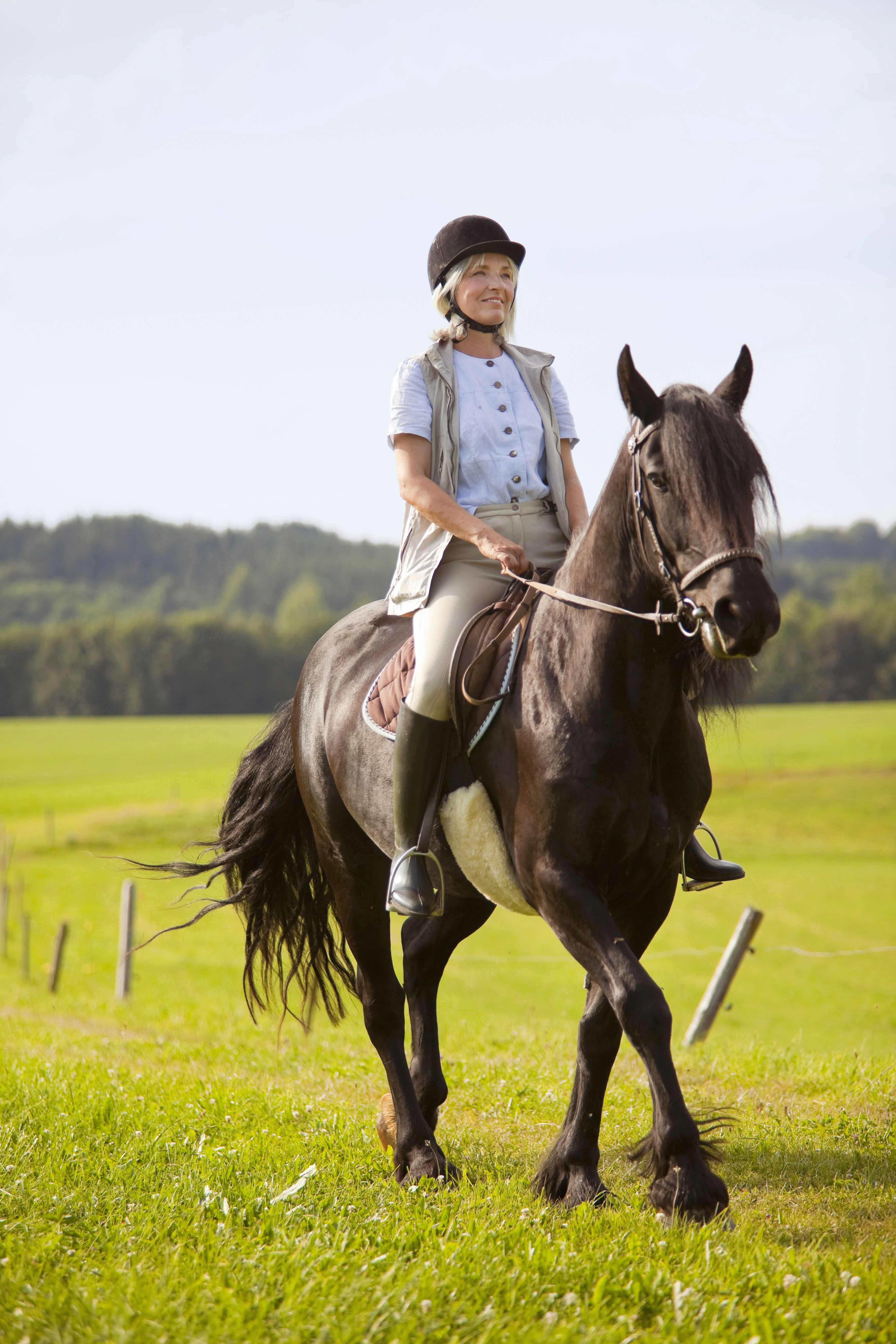germany bavaria mature woman riding horse 160923890 580694de5f9b5805c27c101b jpg
