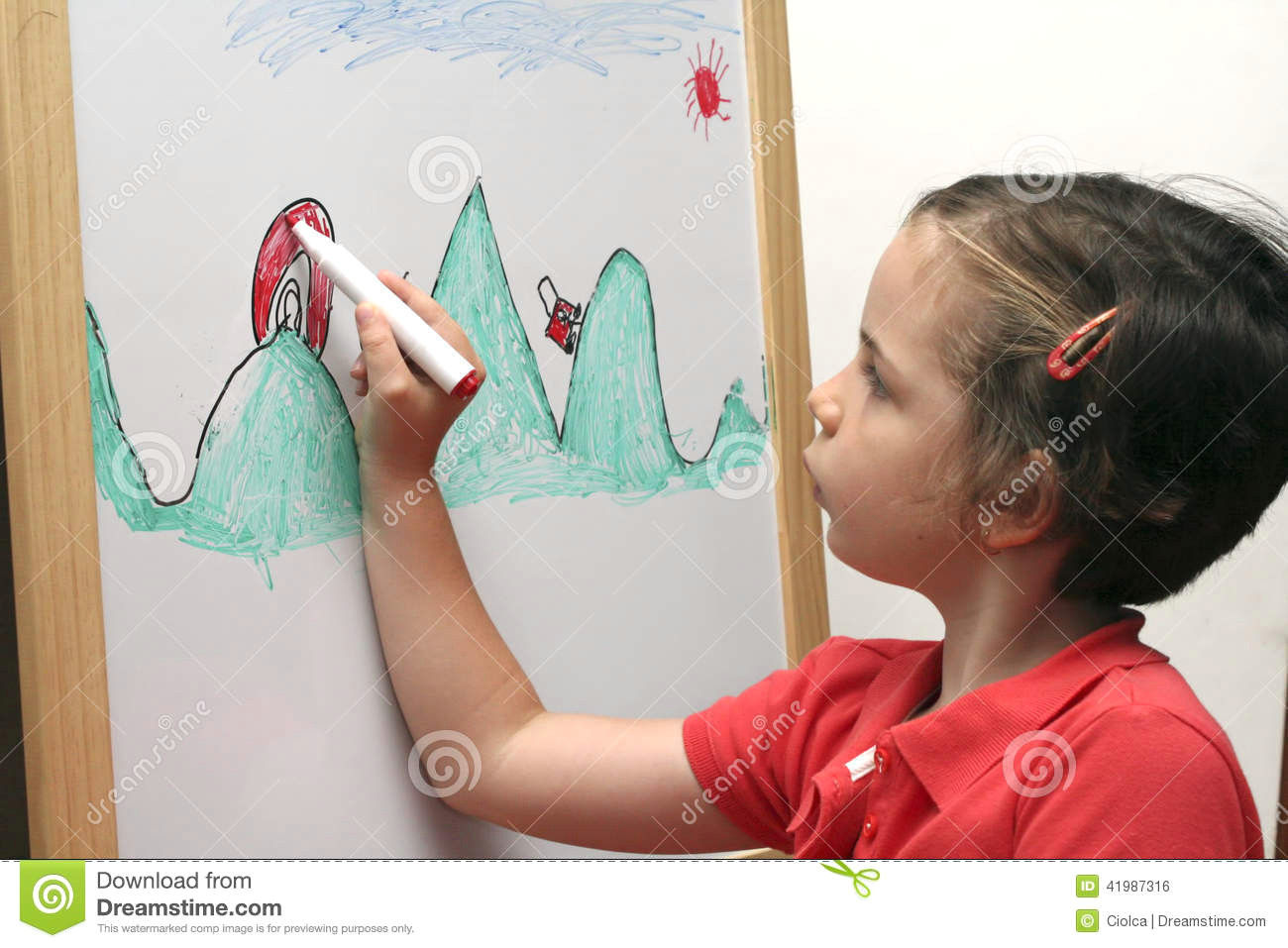 small girl drawing
