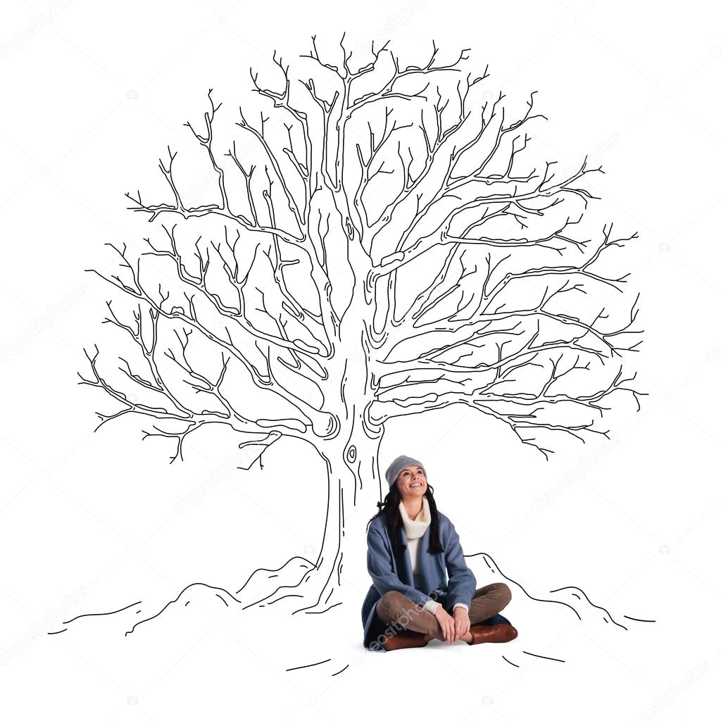 beautiful young cheerful woman looking up with smile while sitting in lotus position under sketch of leafless tree zdja cie od gstockstudio