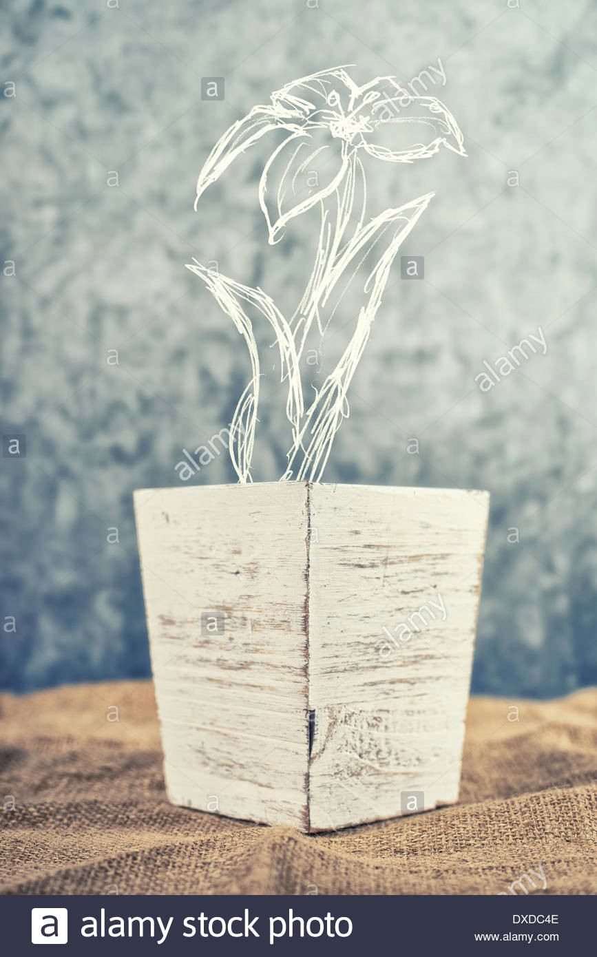 flower pot with sketched flower on kitchen table stock image