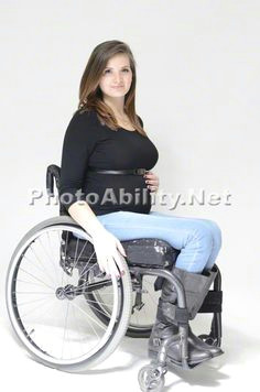 pregnant mom in wheelchair portrait on white