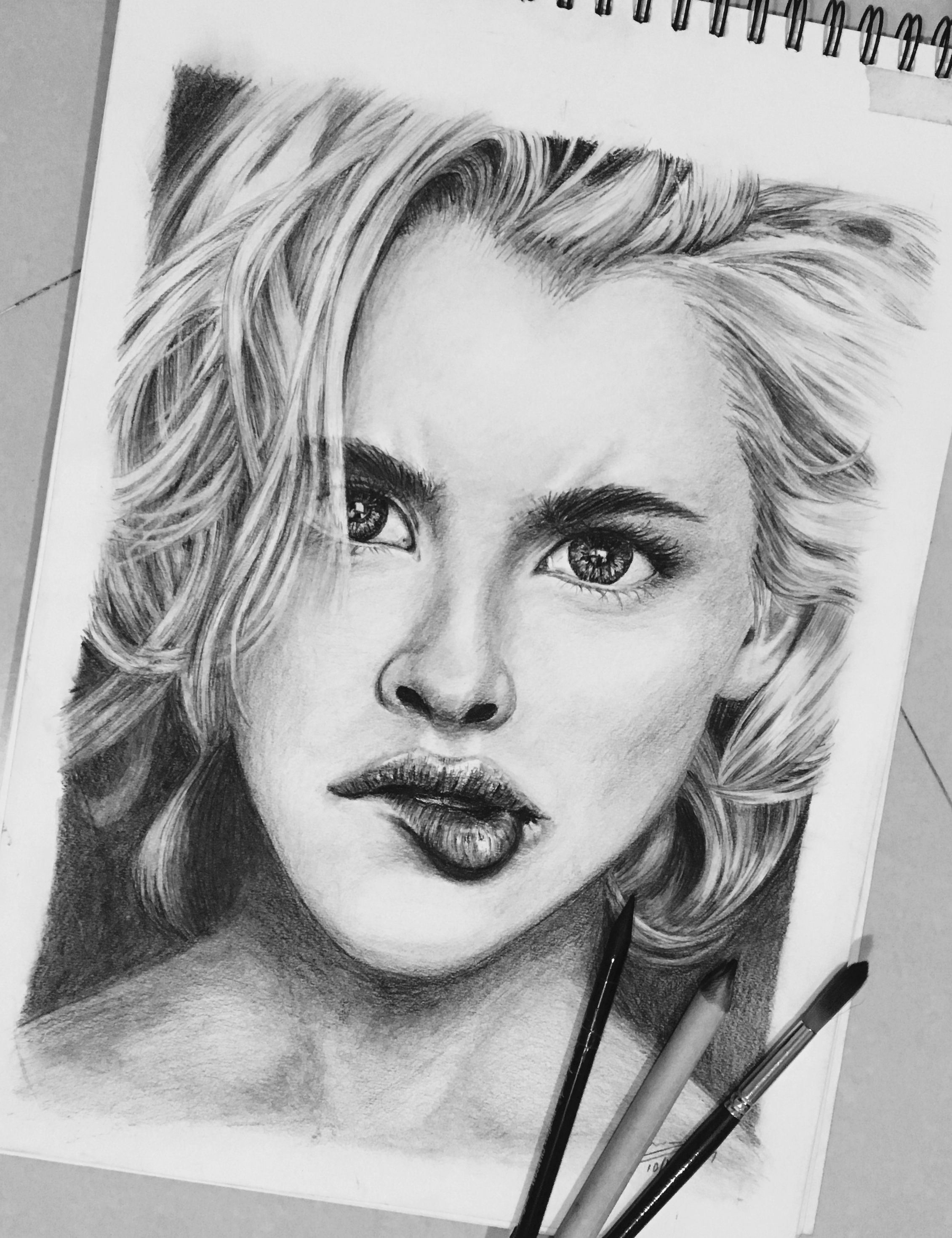 a charcoal pencil drawing done using mont marte woodless charcoal pencils doing blonde hair is a task with only a kneadable eraser