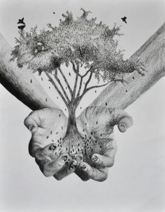 hands holding a tree