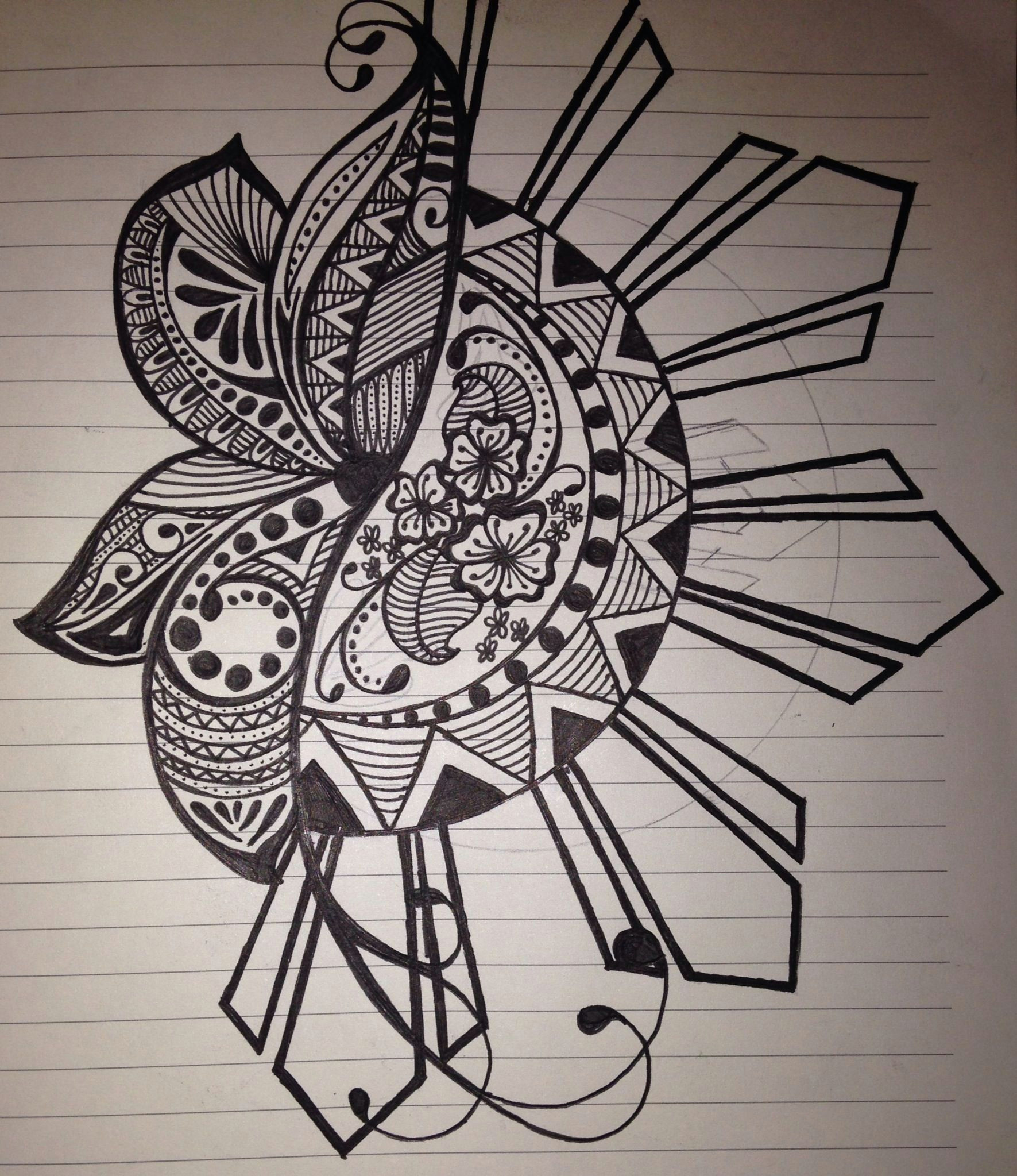 quick sketch of mine i incorporated the filipino sun because i am half lots of different designs in the petals of the flower makes it interesting to me