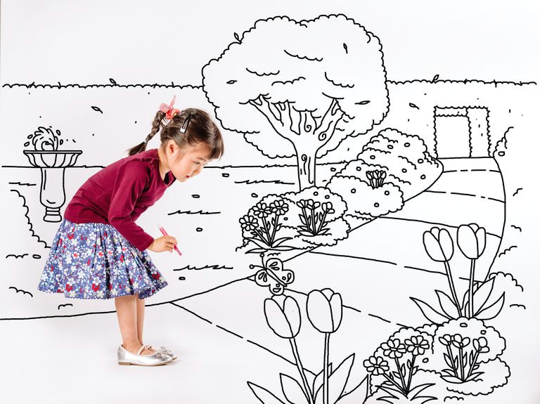 little girl drawing a park on white background