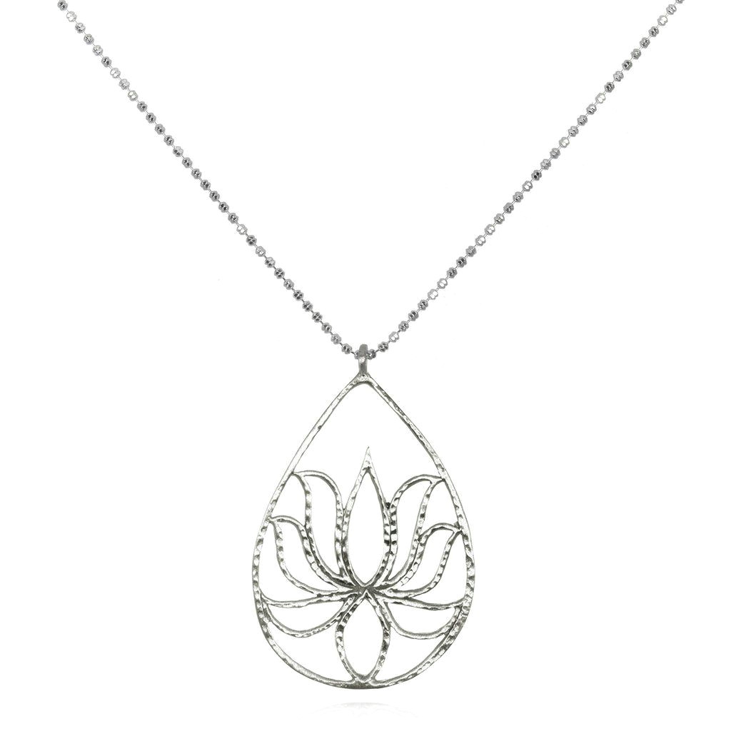 earthy yet bold this dramatic statement piece is especially vibrant as it dangles on a faceted ball chain an intricately outlined lotus flower sits inside