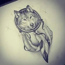 dreamcatchers wolf tatoo ideas a wolf feather tattoo google search