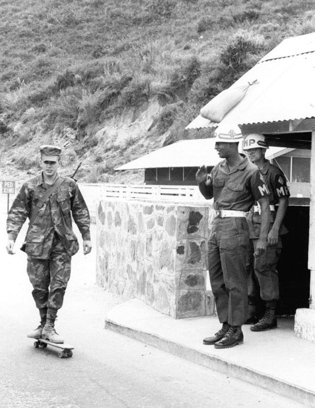 a marine private tries out a skateboard sent from home soldiers behind the lines often