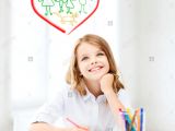 Drawing Of Girl Studying Smiling Little Student Girl Drawing at School Stock Photo 64678459